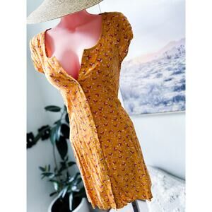 Chasing Wildflowers Golden blooming floral cottagecore pocketed mini dress